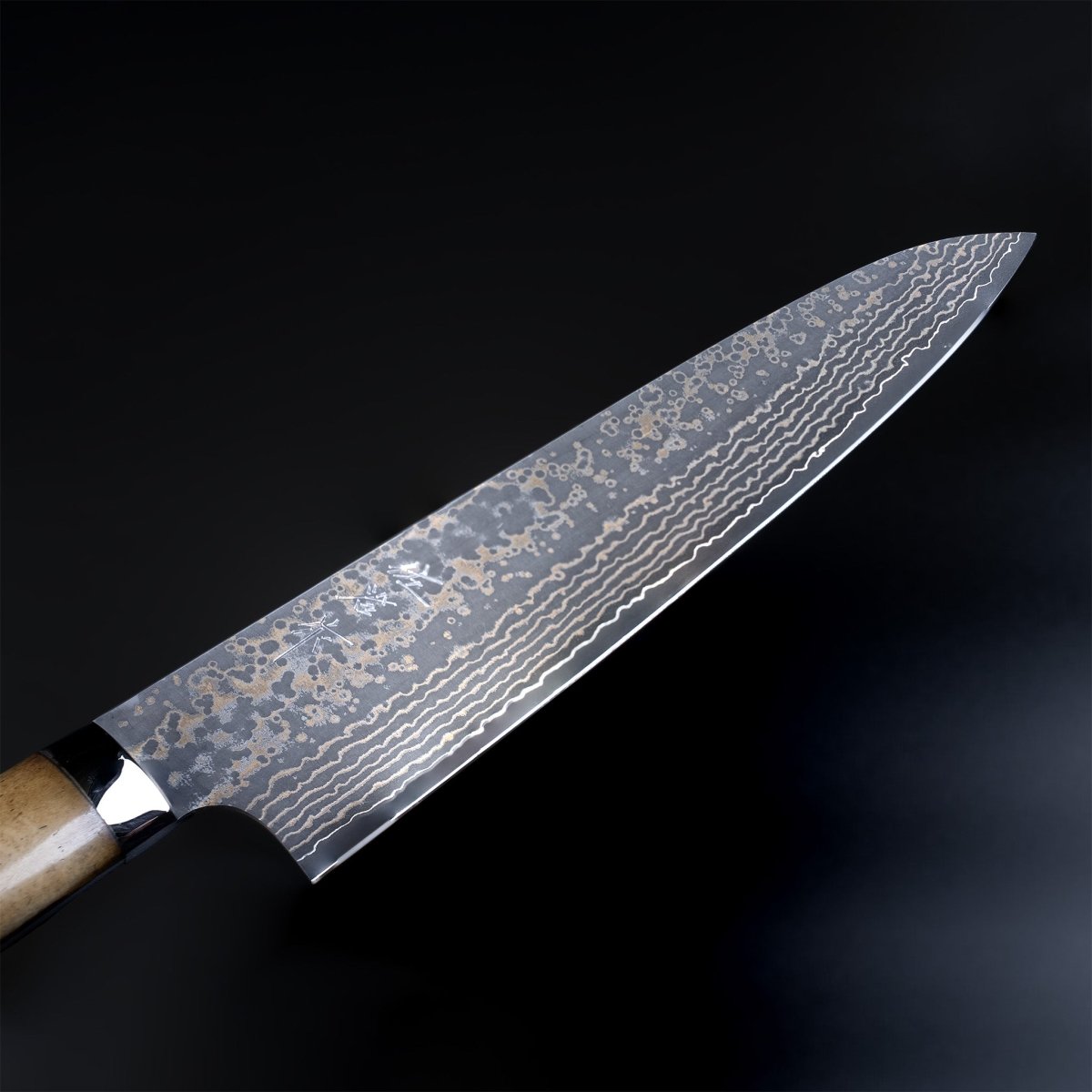 Closeup on tip of Takeshi Saji VG10W Stainless Steel Gyuto 240mm Gold-Toned Finish