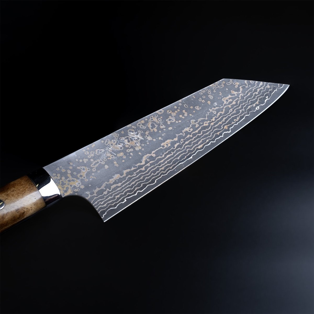 Closeup on tip of Takeshi Saji VG10W Stainless Steel Bunka Knife 180mm Gold-Toned Finish