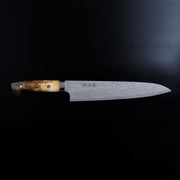 Takeshi Saji VG10W Stainless Steel Gyuto 240mm Gold-Toned Finish displayed horizontally on black background