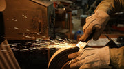 Closeup of Kyohei Shindo hands finishing a blade