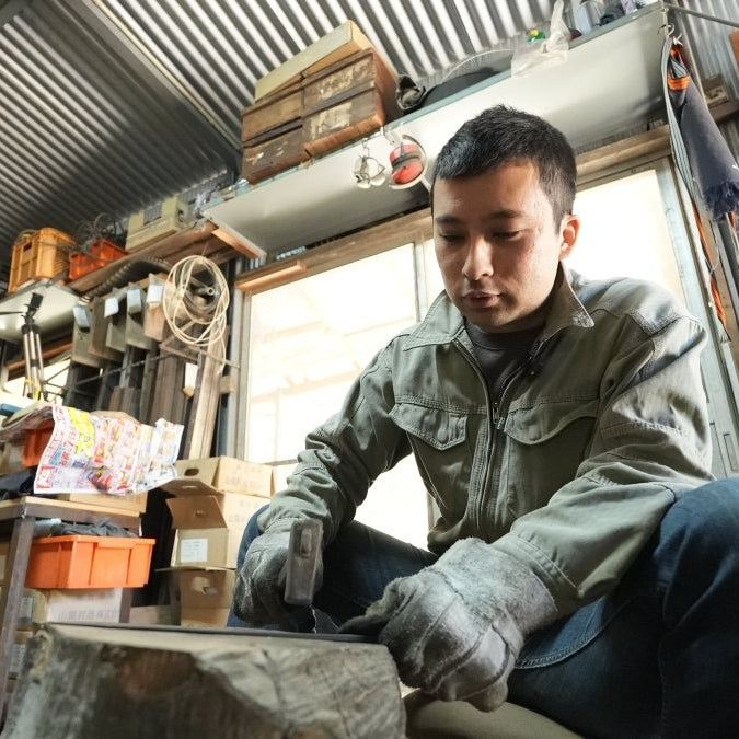 Kyohei Shindo handcrafting a kitchen knife in his knife workshop in Kami, Kochi, Japan