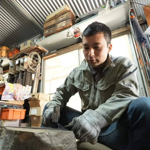 Kyohei Shindo crafting traditional Aogami No 2 kurouchi kitchen knife in his workshop in Kochi, Japan