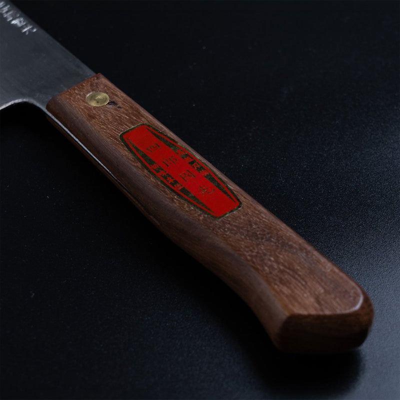 Closeup of the Western style wooden handle with maker name's red label of the Shirou Kunimitsu Stainless Steel Gyuto Knife 230mm