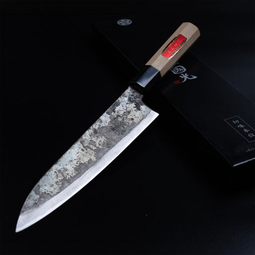 Shirou Kunimitsu Special White Steel Kurouchi Gyuto Knife 210mm with black box in the background