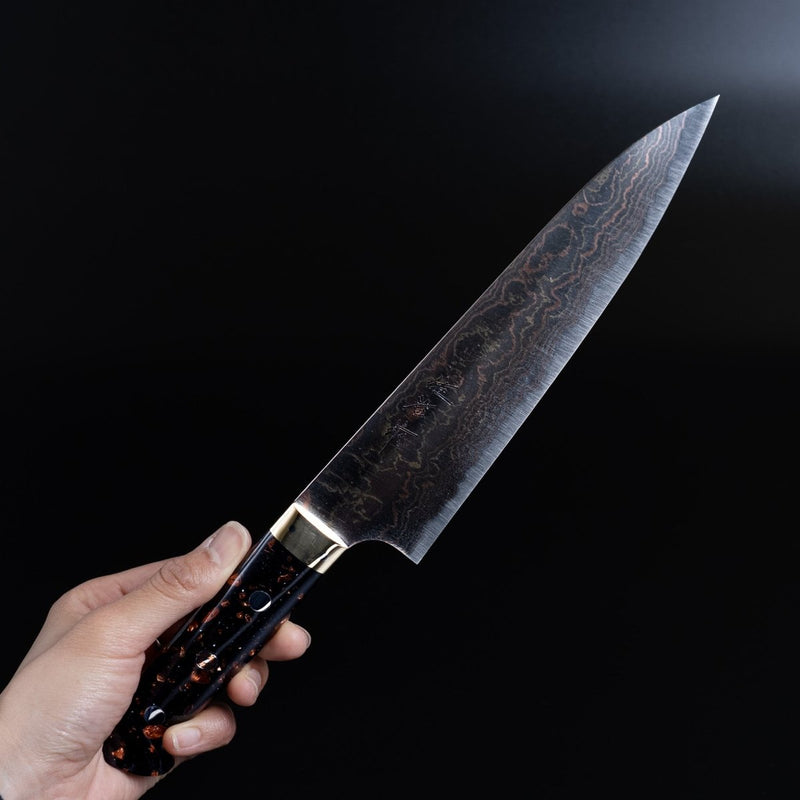 Hand holding Takeshi Saji Aogami Blue Steel 2 Gyuto 180mm