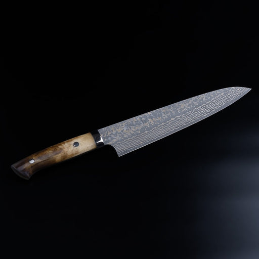 Takeshi Saji VG10W Stainless Steel Gyuto 240mm Gold-Toned Finish displayed diagonally on black background