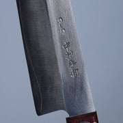 Closeup of the artisan name engraving on the blade of a Nakamura Blacksmith HAP40 Gyuto 200mm