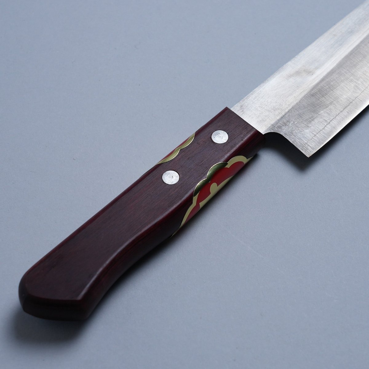 Closeup of the Western style handle of a Nakamura Blacksmith HAP40 Gyuto 200mm