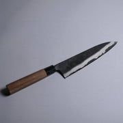 Kyohei Shindo Kurouchi Gyuto 220mm crafted from Aogami 2 in Kochi Japan displayed diagonally on grey background