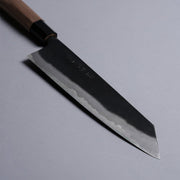 Closeup on tip of Kyohei Shindo Kurouchi Kiritsuke Gyuto 220mm crafted from Aogami 2 in Kochi, Japan on grey background