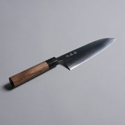 Sakoda Hamono Polished Aogami Super Gyuto 180mm displayed diagonally on grey background