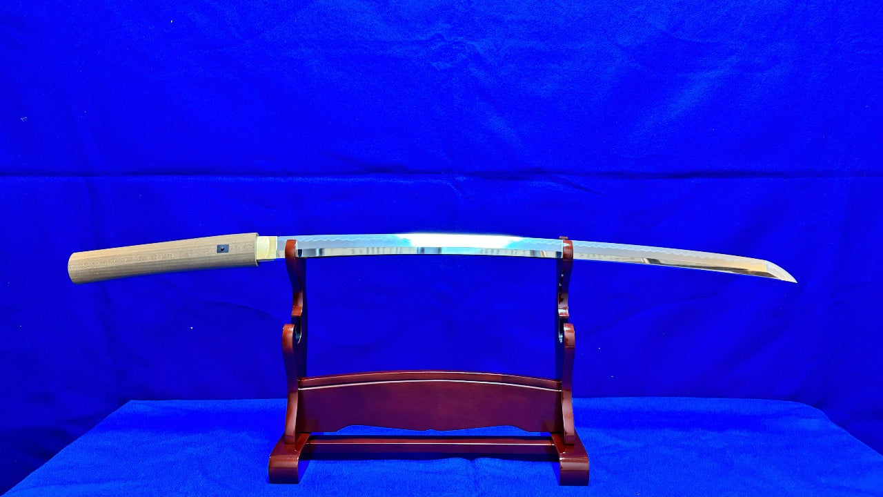 Full size Katana, placed on a wooden Katana stand, with blue background