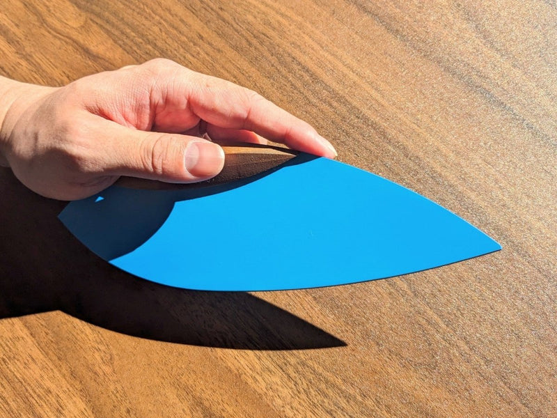 Hand holding Blue 'Happa' Leaf Shaped All - Around Knife by Asano Blacksmith