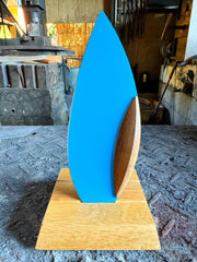 Blue 'Happa' Leaf Shaped All - Around Knife by Asano Blacksmith in its dedicated stand inside the workshop