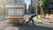 穏やかな街並みを屋台を運ぶ「屋台慶次」料理長の阿部さん