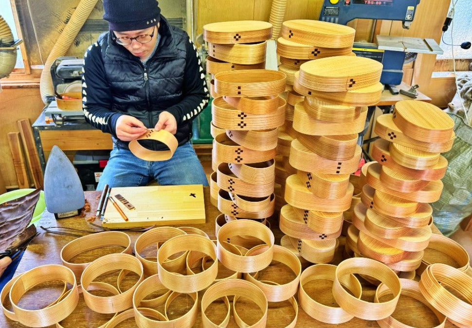 MOCKATS artisan working on the bento lunch boxes