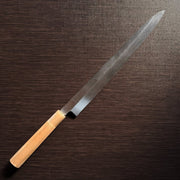 Bizen Osafune Tamahagane Sashimi Knife 310mm laid flat showing the full yanagiba blade profile and magnolia wood handle