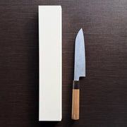 Bizen Osafune Tamahagane Santoku Knife 175mm displayed next to its white presentation box