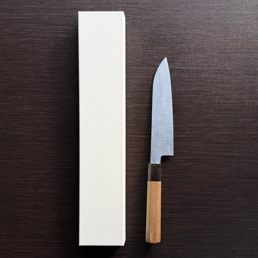 Bizen Osafune Tamahagane Santoku Knife 175mm displayed next to its white presentation box