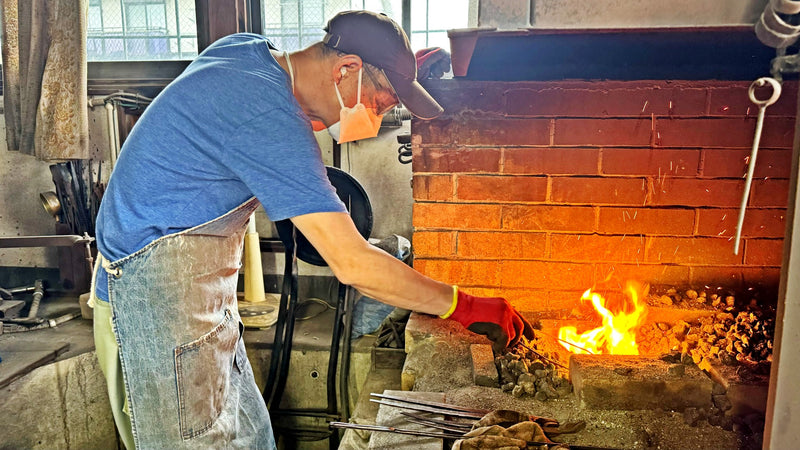 Kawasaki Blacksmith master craftsman heating blades