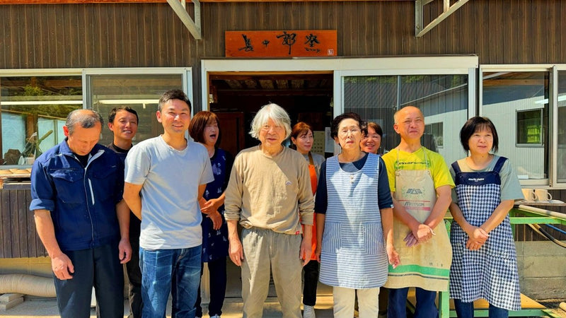 Imari Togei artisans in the entrance of the workshop