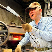 Nakamura Hamono master artisan examining the thickness of a blade