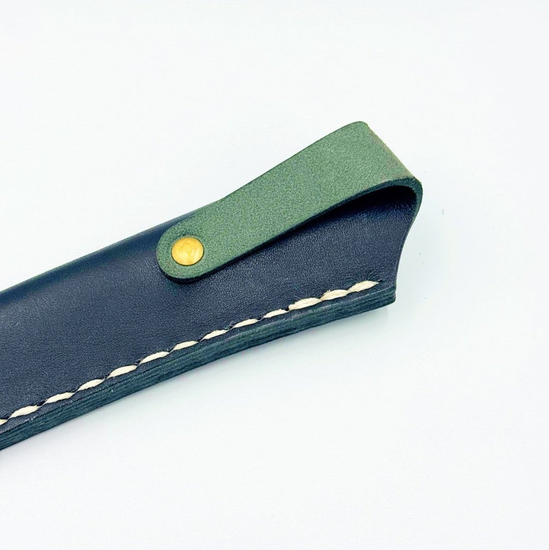 Closeup of the green sheath for the Ignite Knife by Minomo Blacksmith