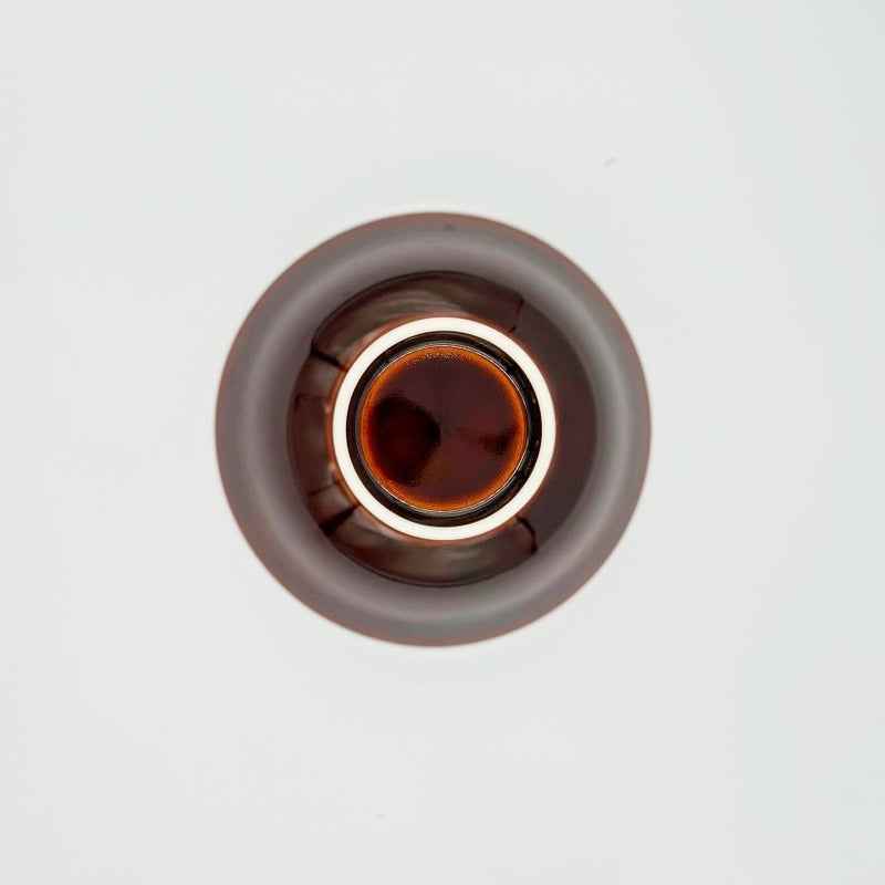Bottom view of Amber Glazed Bowl crafted by Imari Togei craftsmen on light cream background