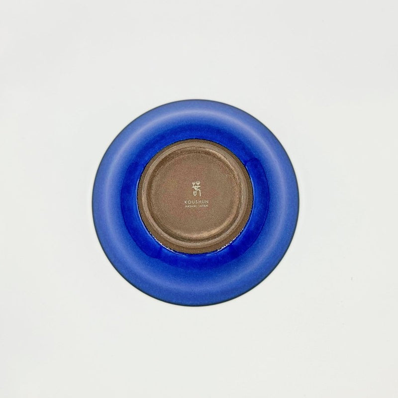 Bottom view of Blue Glazed Bowl crafted by Imari Togei craftsmen on light cream background