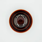 Aerial view of Amber Glazed Bowl crafted by Imari Togei craftsmen on light cream background