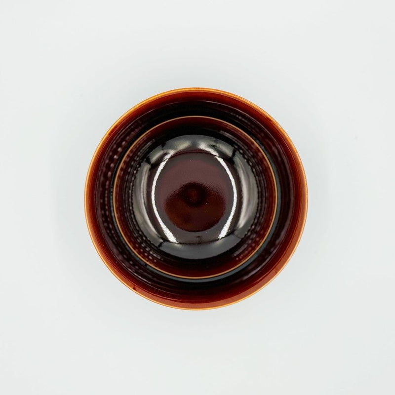 Aerial view of Amber Glazed Bowl crafted by Imari Togei craftsmen on light cream background