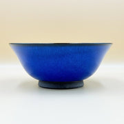 Side view of Blue Glazed Bowl crafted by Imari Togei craftsmen on light cream background