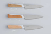 The 3 KISEKI Petty Knife variations (Mizunara Oak, Yamazakura Cherry and Beech) vertically aligned over a light grey background