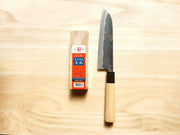 Minomo Blacksmith Santoku Knife next to Amakusa Red Sharpening Stone
