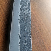 Engraving on the blade of a Minomo Blacksmith Knife With Custom Name Engraving