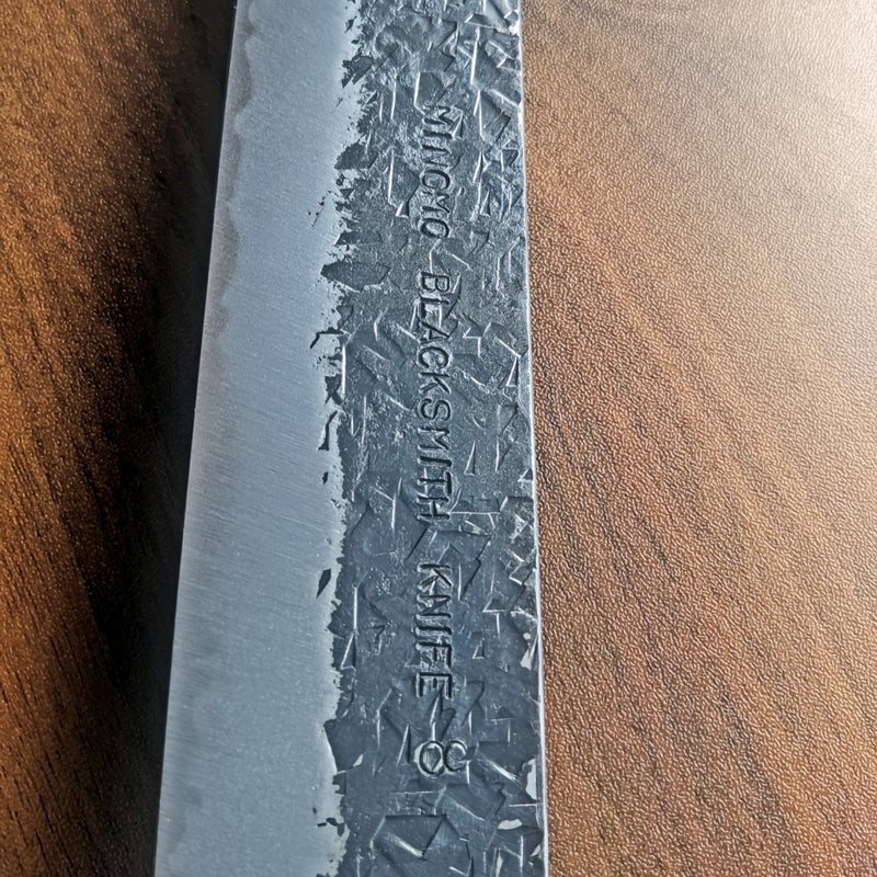 Engraving on the blade of a Minomo Blacksmith Knife With Custom Name Engraving