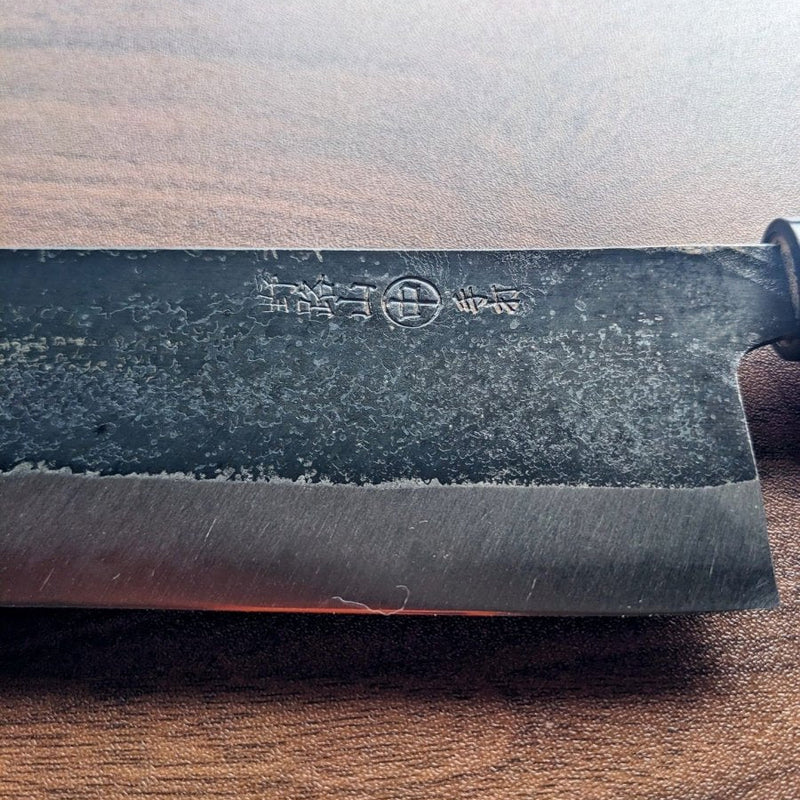 Closeup of a Nakamura Hamono Nakiri Knife 170mm´s artisan mark on the blade