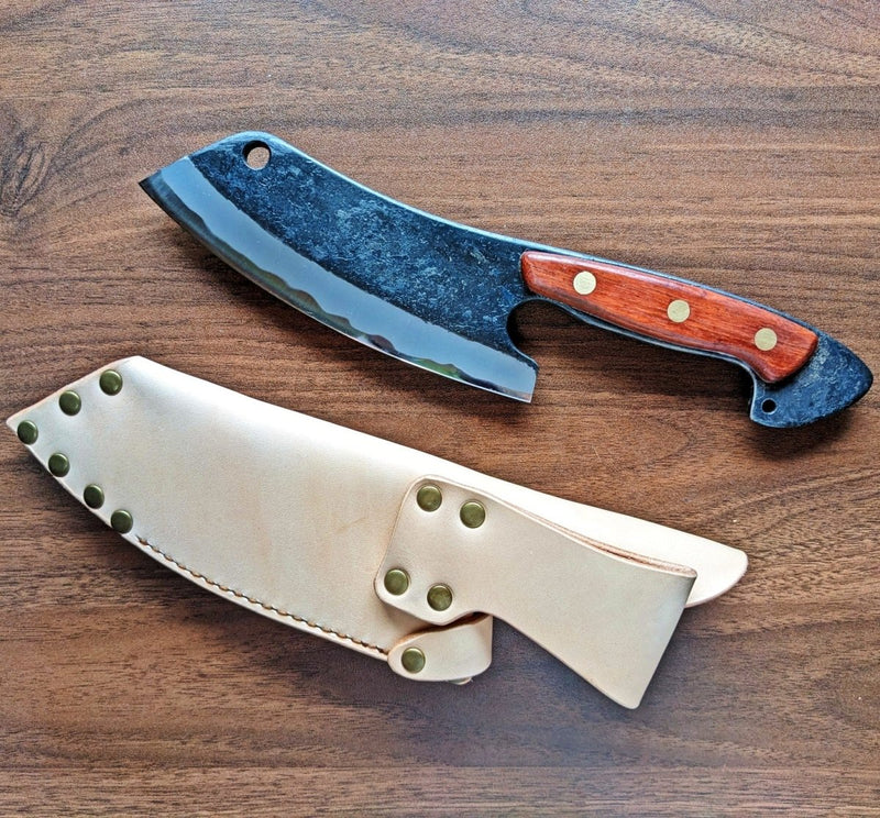 Kurotori Butcher Knife with leather case on wooden background