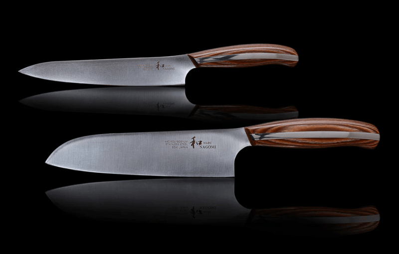 NAGOMI 2 - Piece Set (Santoku Knife and Petty Knife) by Mitsuboshi Cutlery on black background with reflections