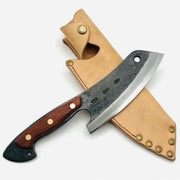 Kurotori Butcher Knife atop tan leather case on white background