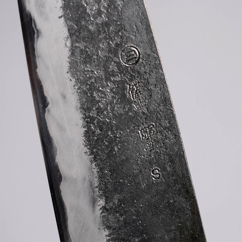 Close up of a blade knife with the Miwa Hamono artisan engraving