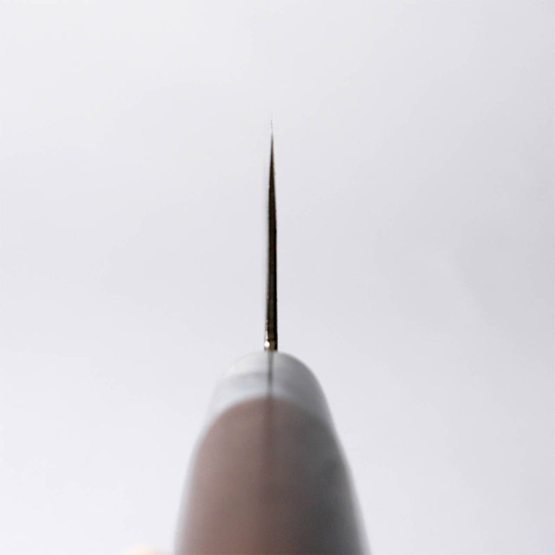 Closeup of a Miwa Hamono Kurouchi Aogami No.1 Santoku Knife 165mm blade thickness