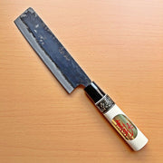 Kurouchi Nakiri Knife 155mm crafted by Shigemitsu Hamono diagonal on wood background (front side)