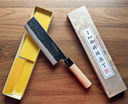 Nakiri Knife 170mm by Nakamura Hamono  in an open box showcasing the Japanese label