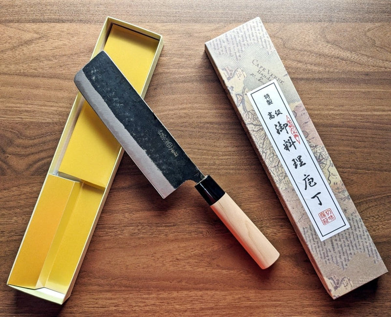 Nakiri Knife 170mm by Nakamura Hamono  in an open box showcasing the Japanese label