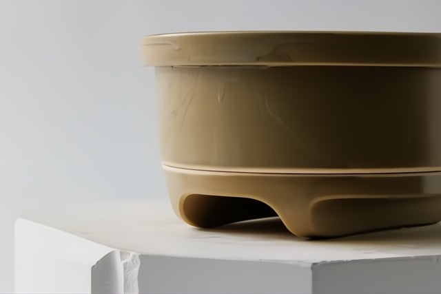 A pot is stacked on a lid.