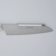KISEKI Knife Attachment for Sharpening on a KISEKI Santoku Knife over a light grey background