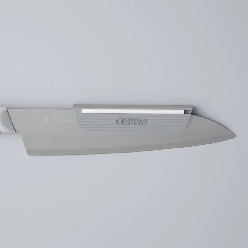 KISEKI Knife Attachment for Sharpening on a KISEKI Santoku Knife over a light grey background