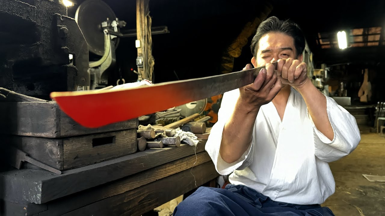 Shirou Kunimitsu blacksmith checking a heated blade