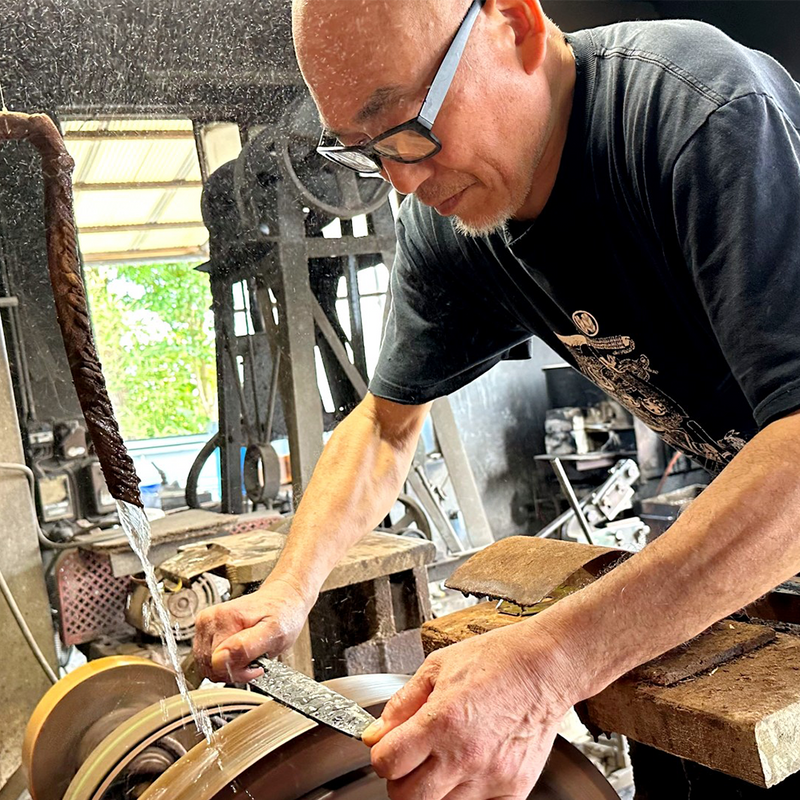 Minomo Blacksmith 9th generation artisan, dad Minoru san, polishing a knife